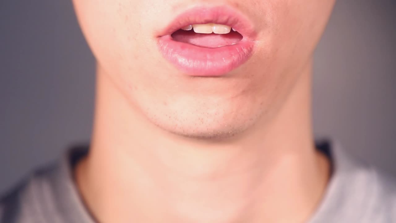 Close-up of the performer's mouth